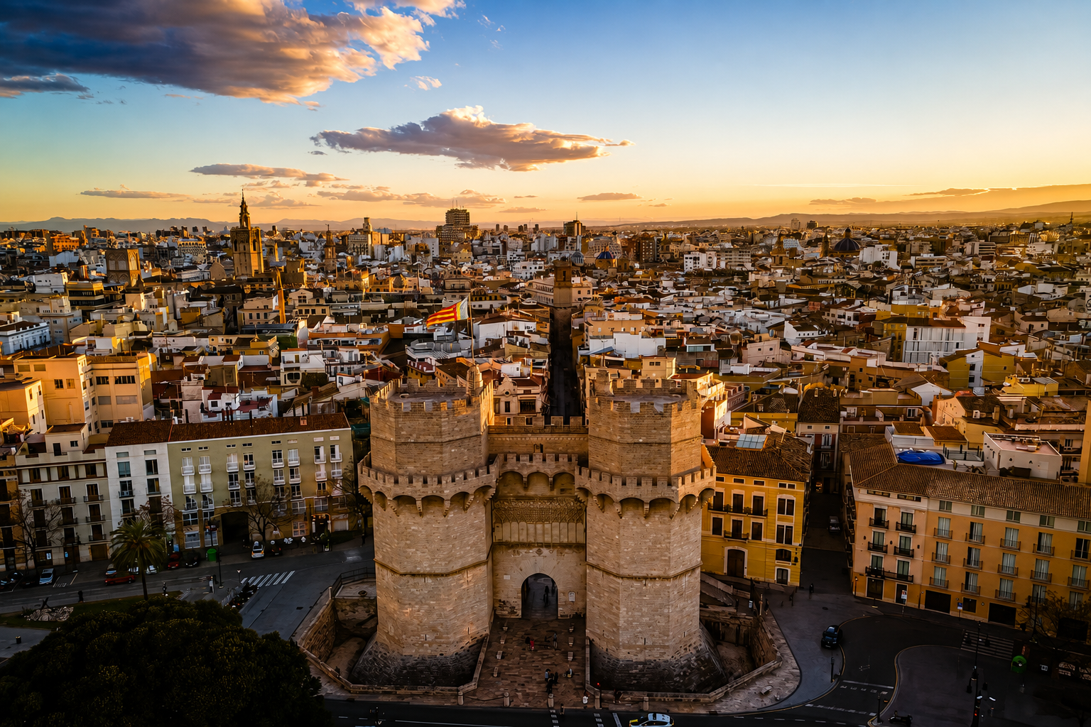 Torres de Serranos in Valencia at sunset with the historic city centre in the