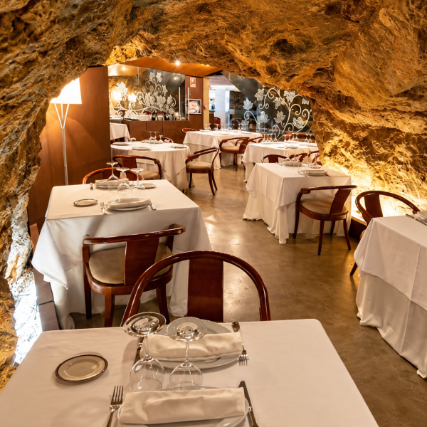 Elegant dining room inside a natural cave near Valencia